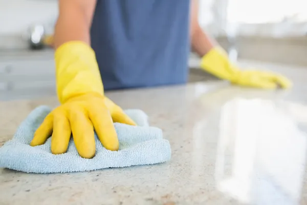 depositphotos_23050622-stock-photo-woman-cleaning-the-counter